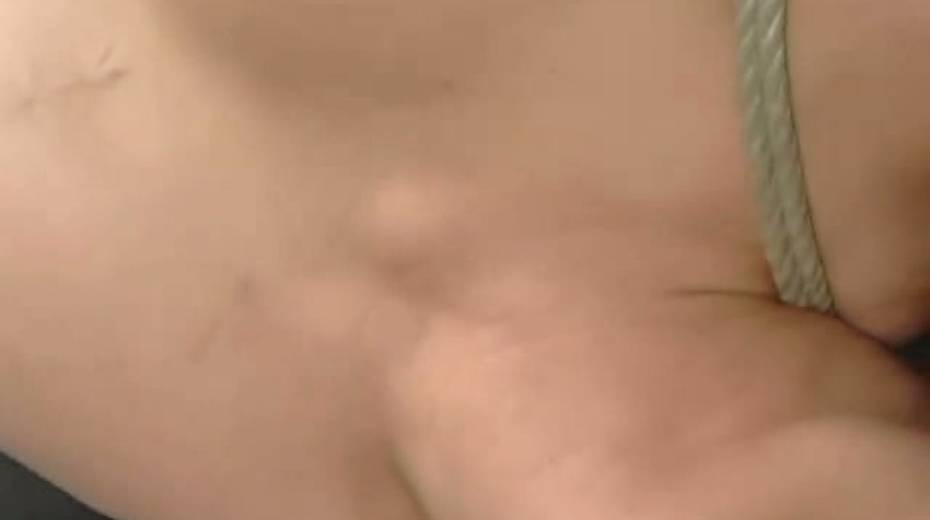 Asian sex-slave is fucked with  sex-machine in suspended position - 7. pic