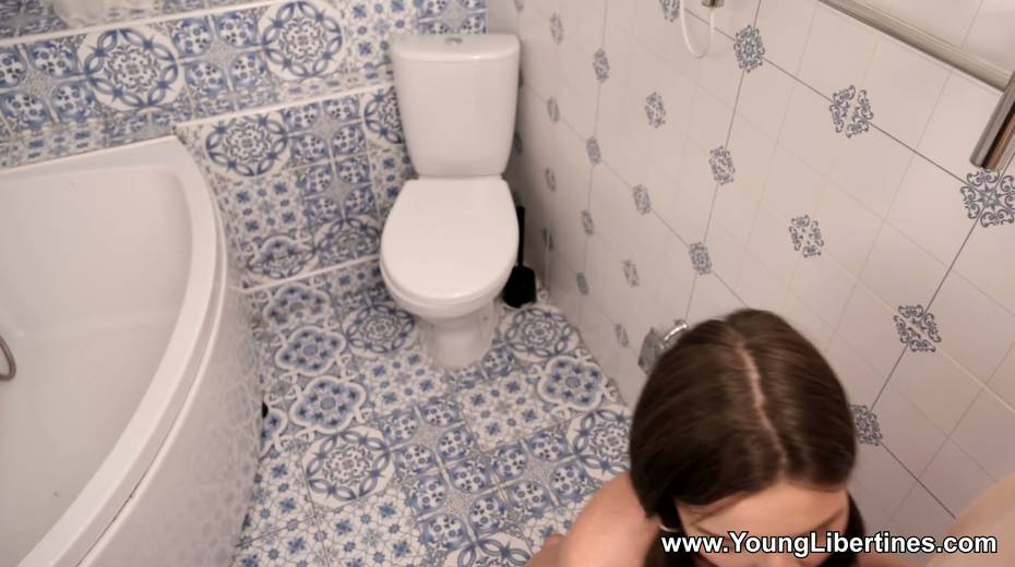 Cute teen with pigtails Kelly Rouss gets a mouthful of cum after sex in the bathroom - 4. pic