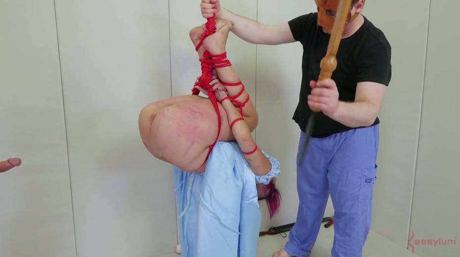 Two perverted guys spank and fuck anal hole of tied up and suspended porn model - 10. pic