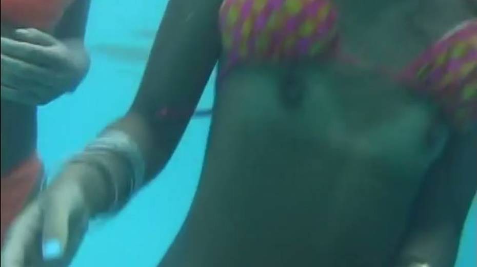 Frisky Japanese girls takes bikinis off right in a pool - 8. pic