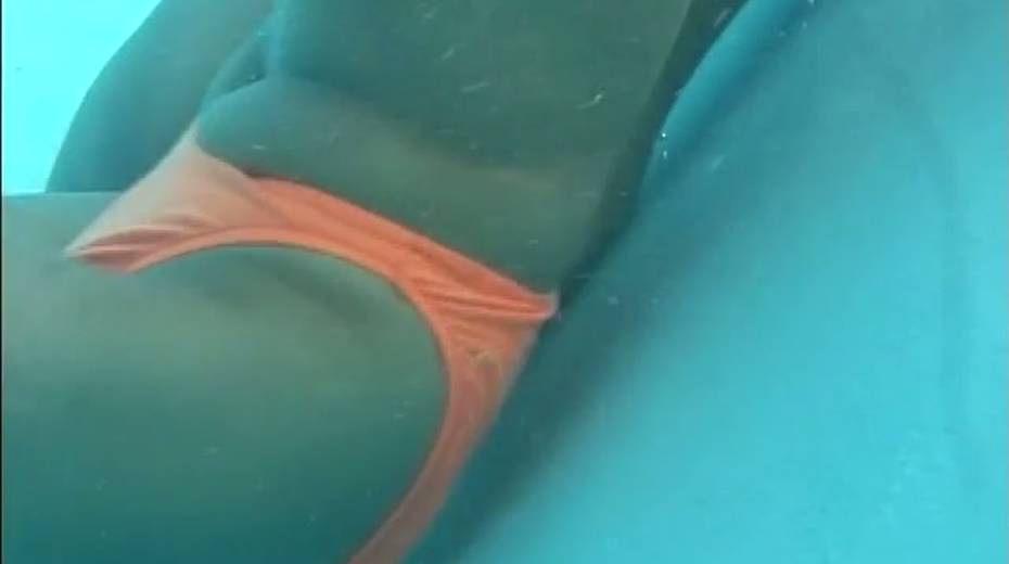Frisky Japanese girls takes bikinis off right in a pool - 10. pic
