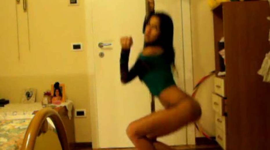 Good looking chick is dancing topless around the pole - 7. pic