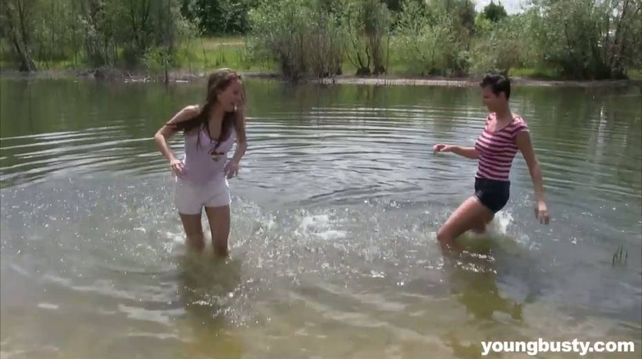 Two beautiful teens can't stop pleasing each others pussies outdoor - 2. pic