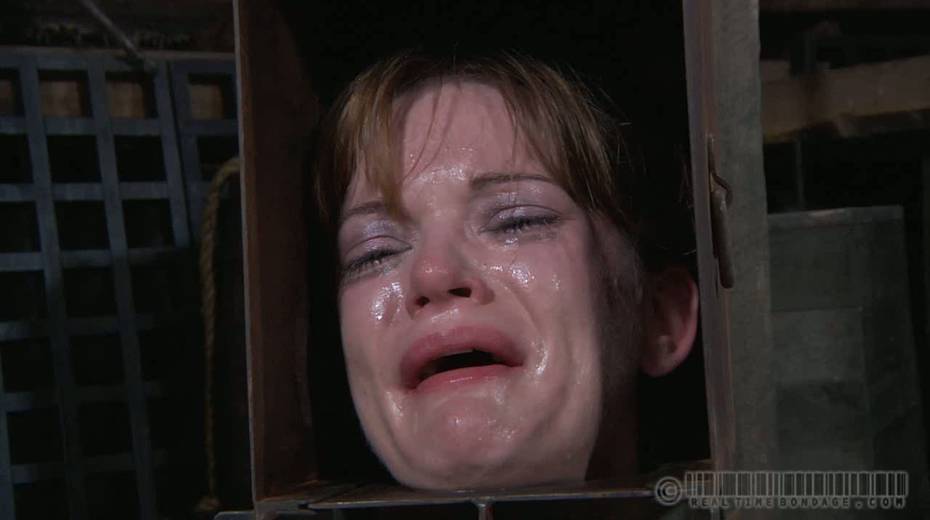Restrained chick with metal box on her head is crying - 7. pic