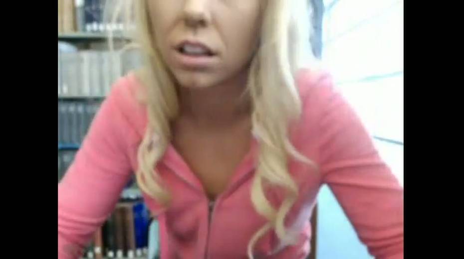 Frisky amateur girl flashes her titties in public library - 12. pic
