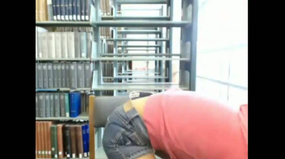 Frisky amateur girl flashes her titties in public library - 14. pic