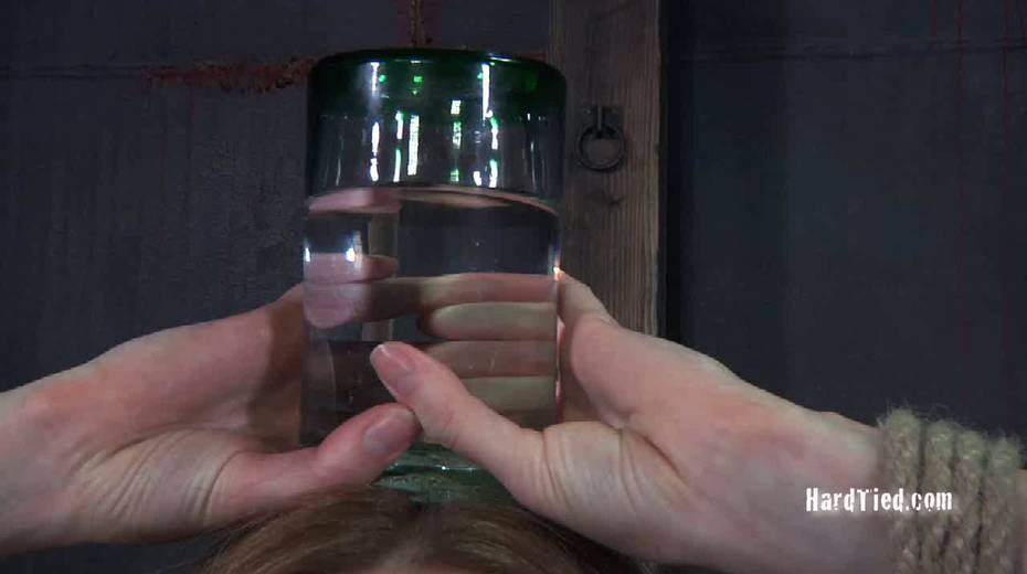 Pervert is conducting experiments with glass of water and tied up nasty gal - 12. pic