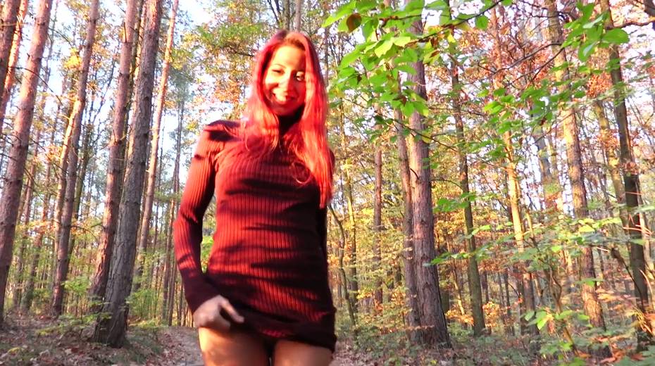 Red haired seductress Paula Shy takes off her clothes in the forest - 3. pic