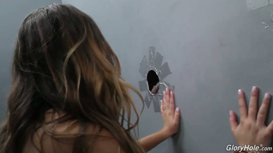 Slutty chick Melissa Moore goes wild in the glory hole room - 18. pic