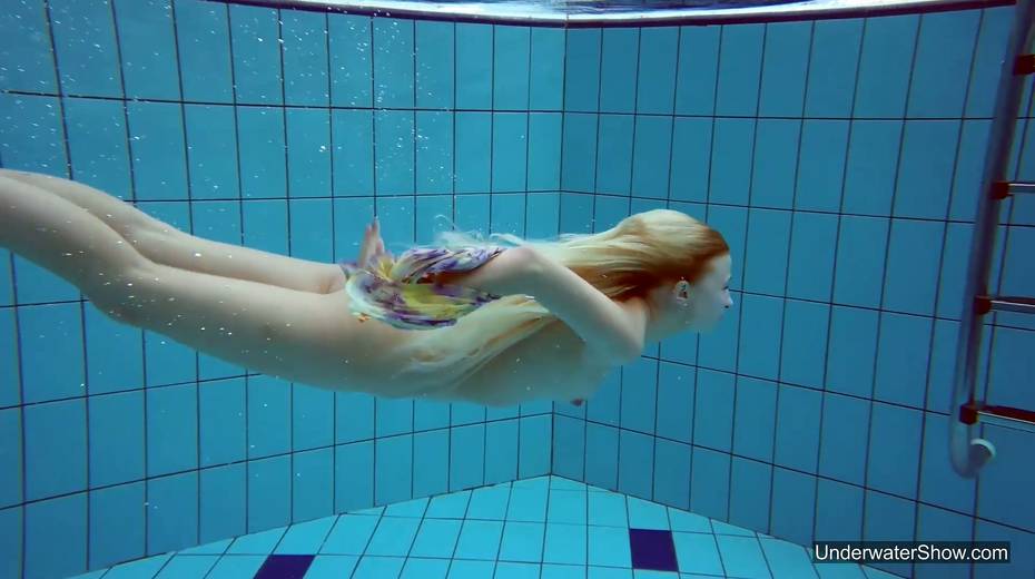 Attractive swimmer Milana Voda is stripping under the water - 9. pic